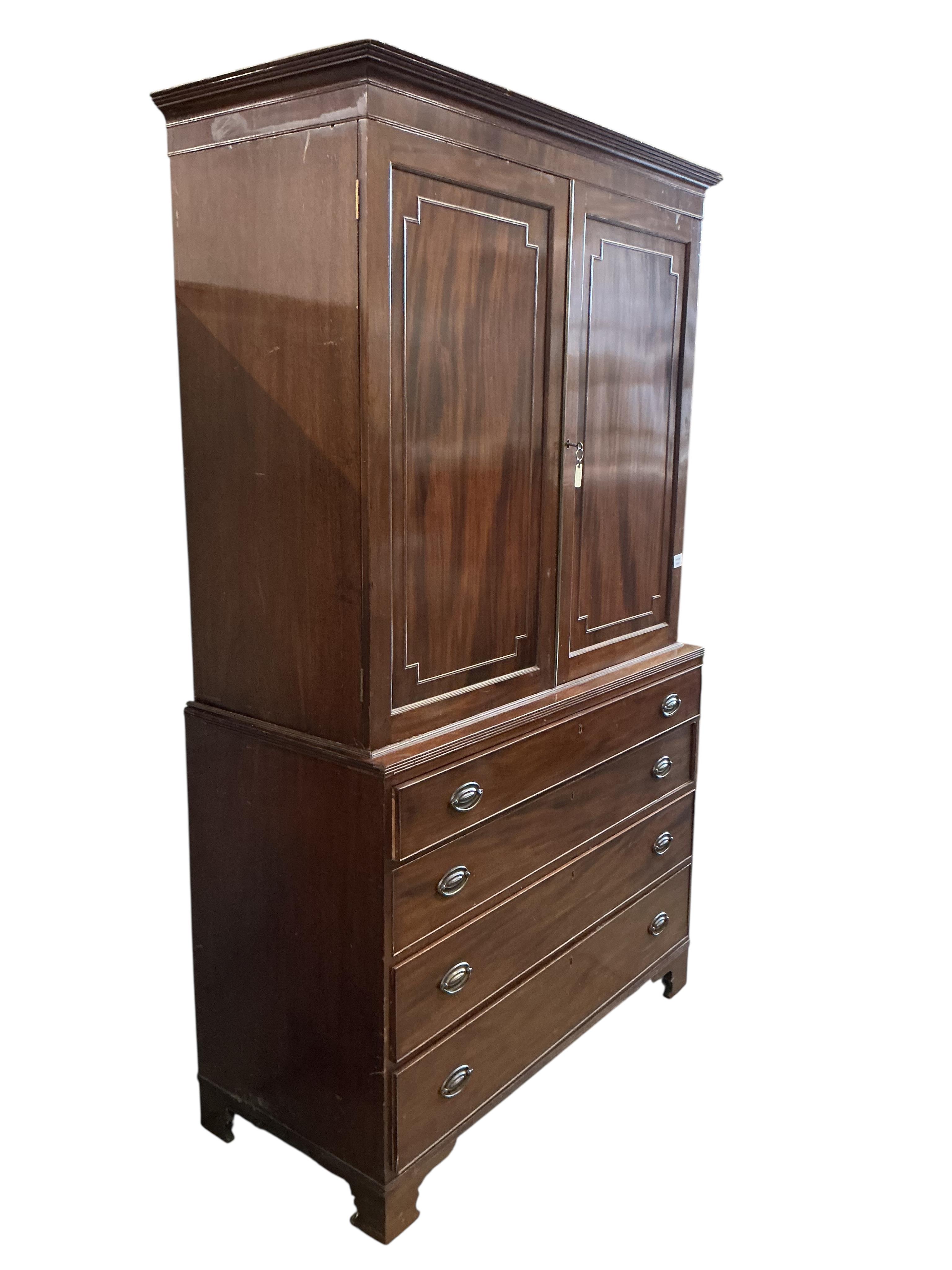 A Regency mahogany linen press, width 122cm, depth 56cm, height 210cm